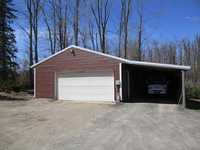 6876 Old Alba Rd, Gaylord, MI 49735 - garage with a garage