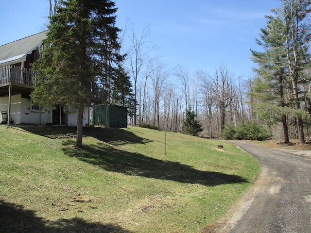 6876 Old Alba Rd, Gaylord, MI 49735 - view of yard with a deck