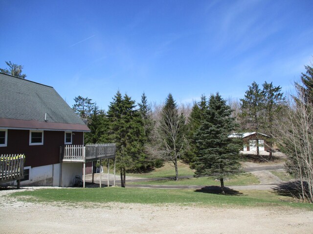 6876 Old Alba Rd, Gaylord, MI 49735 - view of yard with a deck