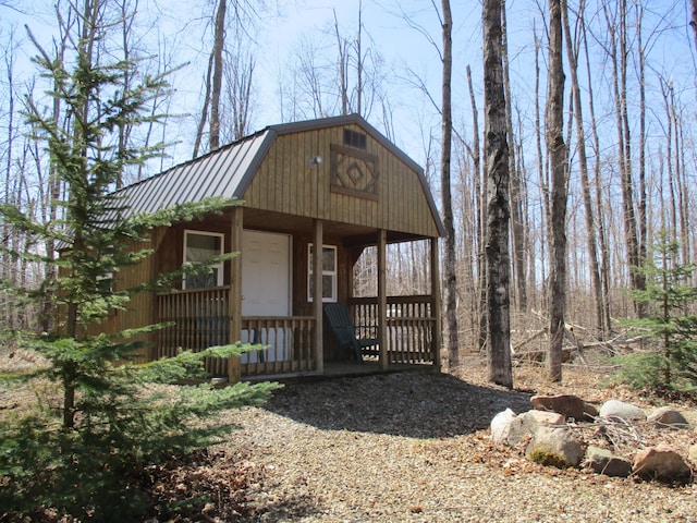 6876 Old Alba Rd, Gaylord, MI 49735 - view of outbuilding featuring a porch