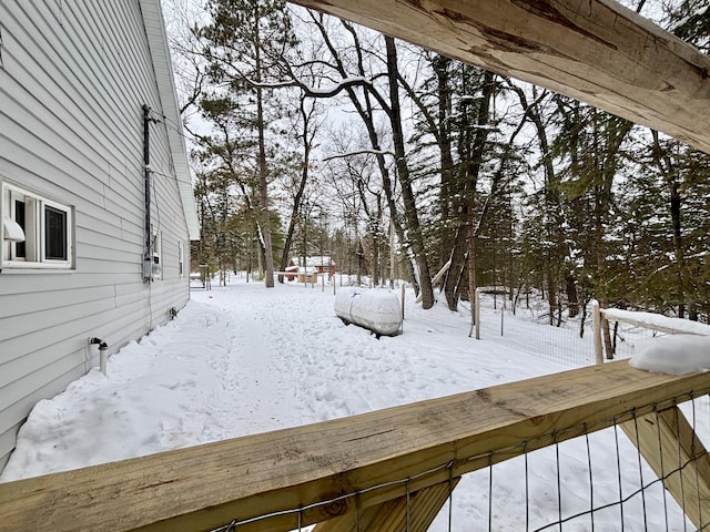 view of snowy yard