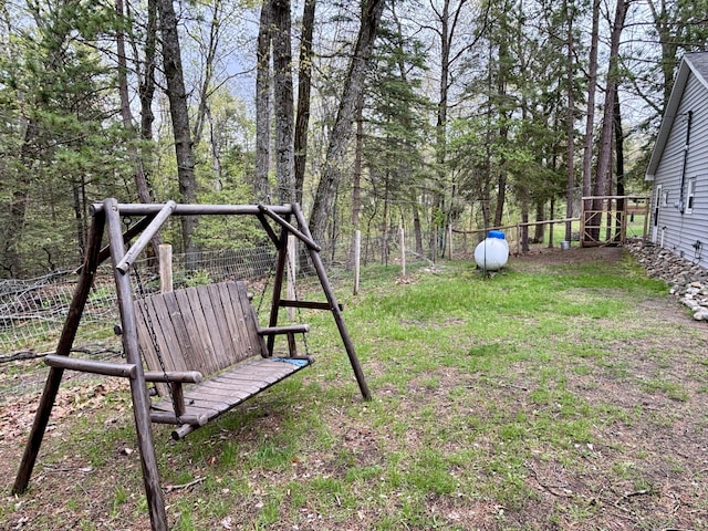 4804 Basil Dr, Comins, MI 48619 - view of yard featuring fence