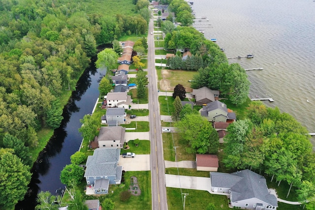 944 Long Point Dr, Houghton Lake, MI 48629 - aerial overview of property's location with a large body of water and nearby suburban area