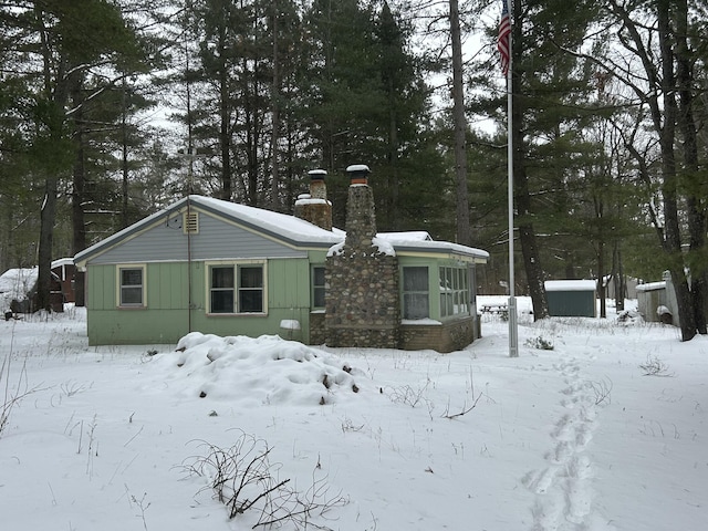 exterior space featuring a chimney