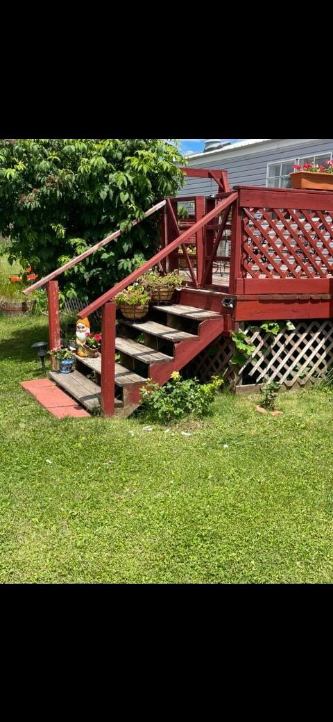 exterior space featuring stairway and a deck