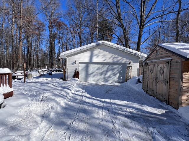 exterior space with a garage