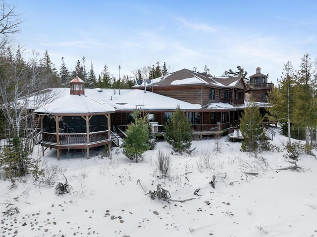 view of snow covered house