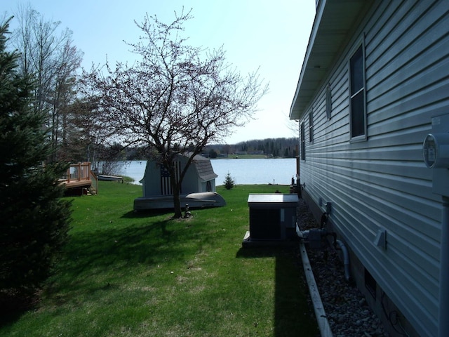 15117 Valley Dr, Wolverine, MI 49799 - view of grassy yard featuring a water view