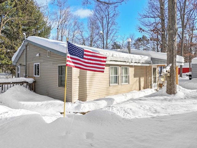 view of snow covered property