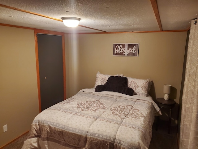 bedroom featuring a textured ceiling