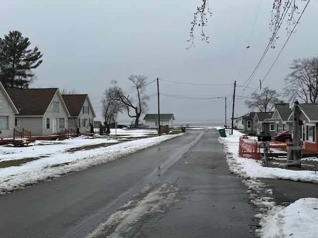 view of road with a residential view