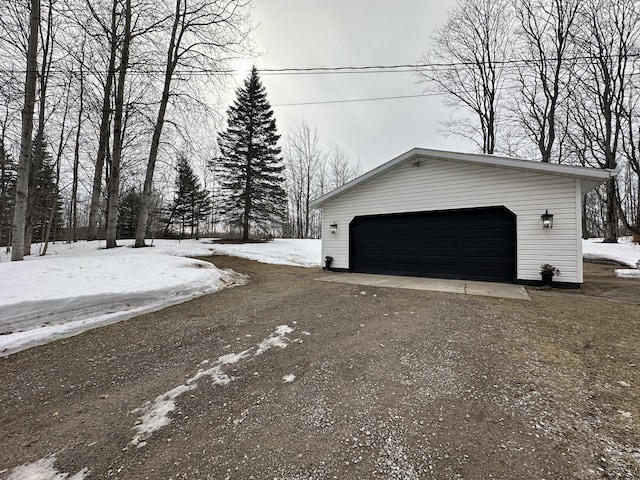 view of snow covered garage