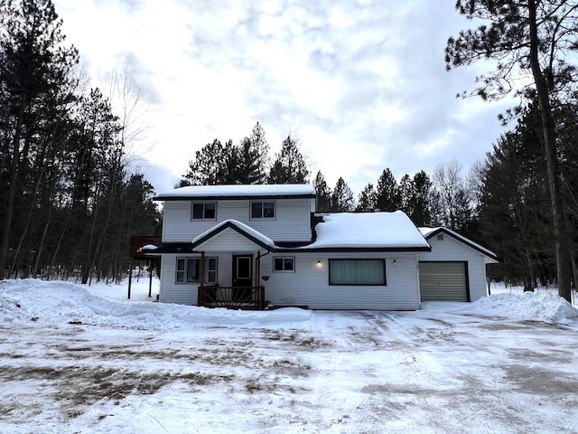 traditional-style home with an outbuilding and an attached garage