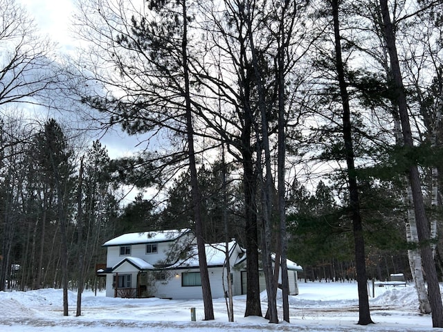 view of snow covered property