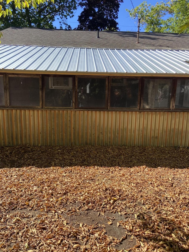 view of yard with a sunroom