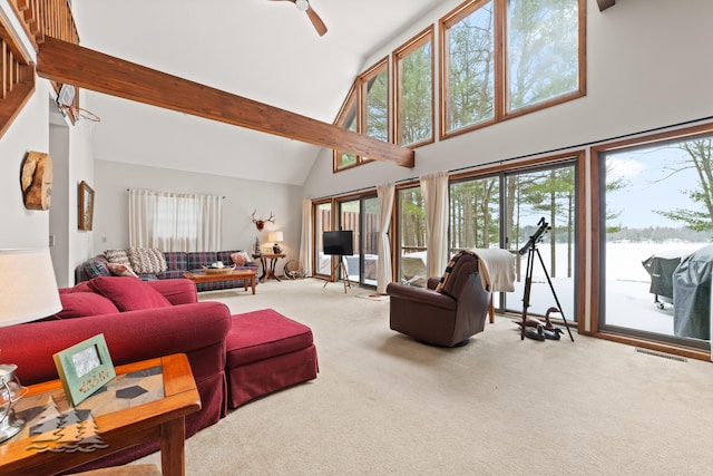 living room featuring beamed ceiling, visible vents, high vaulted ceiling, carpet floors, and ceiling fan