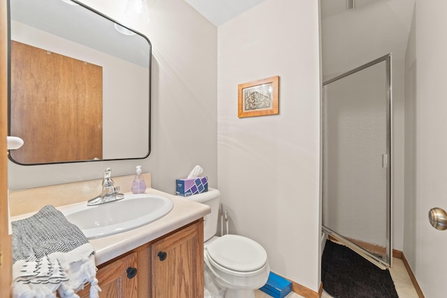 full bathroom with vanity, toilet, and a shower