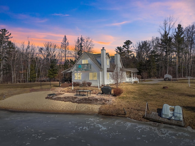 view of front of property with a chimney