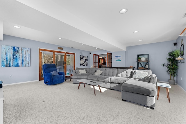 living room with visible vents, recessed lighting, carpet, and baseboards