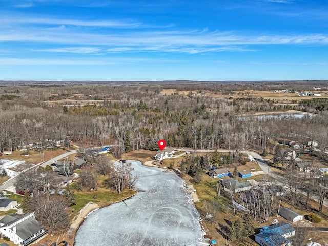 aerial view featuring a view of trees