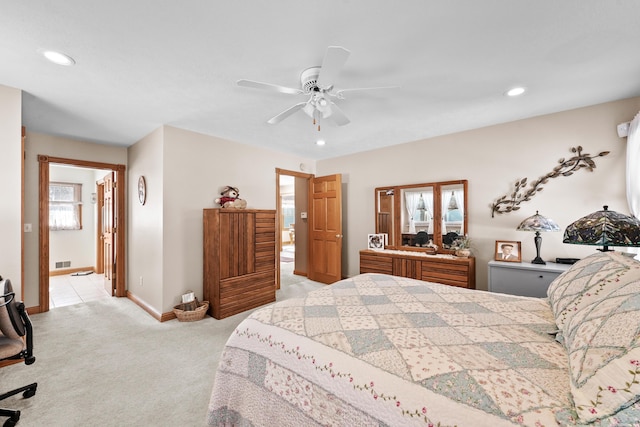 bedroom with recessed lighting, visible vents, baseboards, and light colored carpet