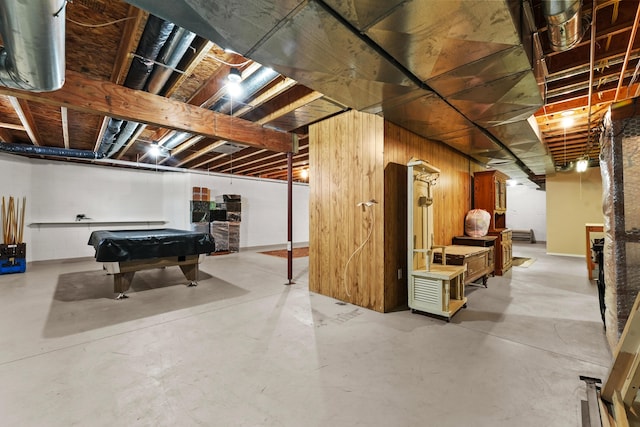 unfinished basement with billiards