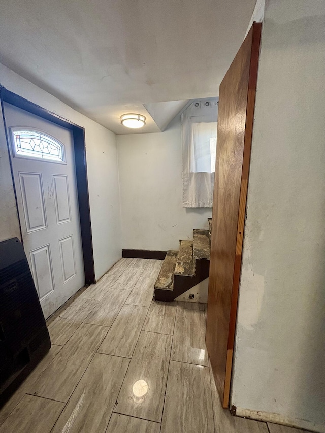 entrance foyer featuring wood tiled floor