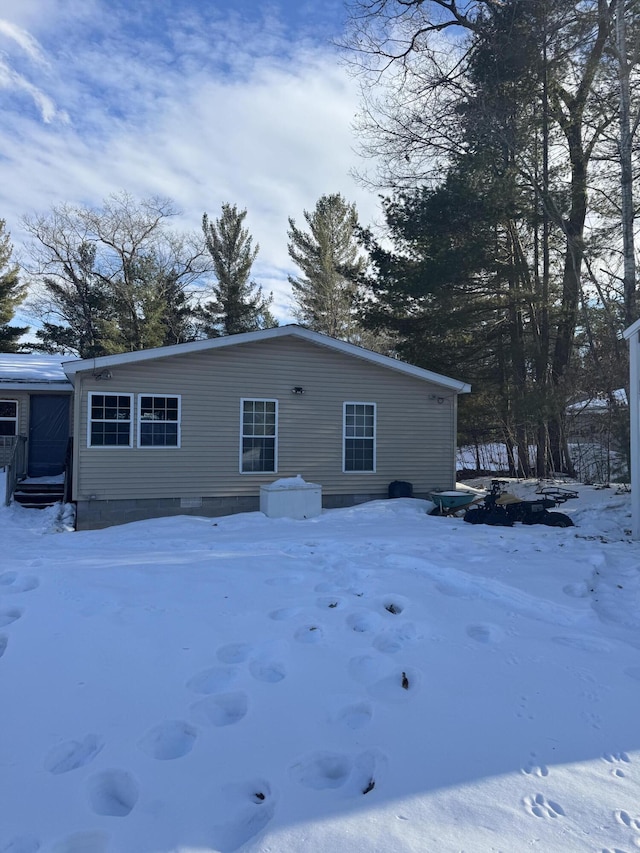 view of snow covered property