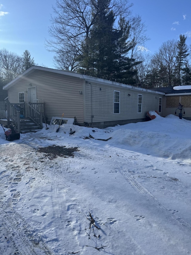 view of snow covered property