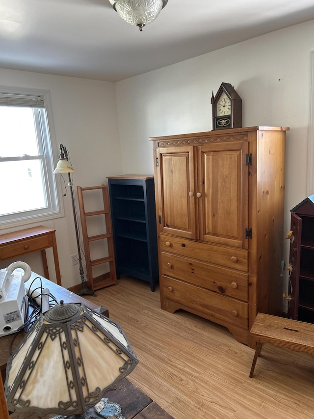 bedroom with light wood-style floors