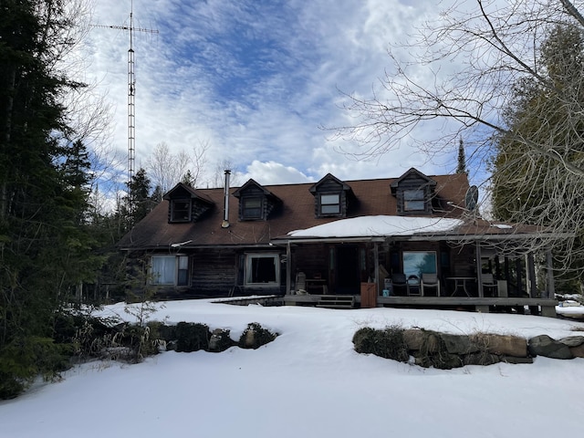 8610 Lincoln Bay Dr, Alpena, MI 49707 - view of front of house with covered porch