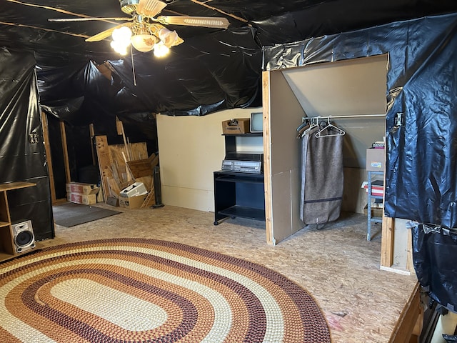 8610 Lincoln Bay Dr, Alpena, MI 49707 - basement with ceiling fan