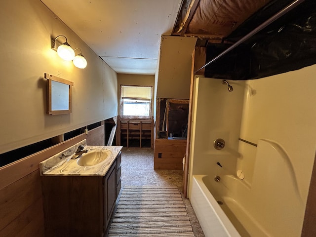 8610 Lincoln Bay Dr, Alpena, MI 49707 - full bathroom with vanity and washtub / shower combination