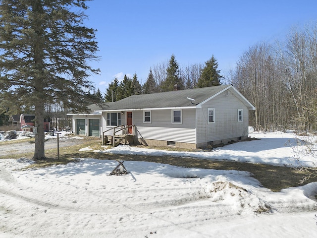 view of front of property featuring a garage