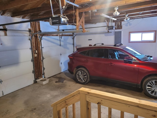 garage featuring a garage door opener