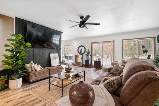 living area featuring recessed lighting, wood finished floors, and ceiling fan