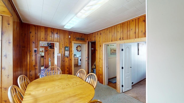 dining space featuring carpet floors