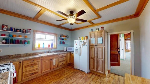 kitchen featuring white appliances, a ceiling fan, open shelves, a sink, and light wood-type flooring