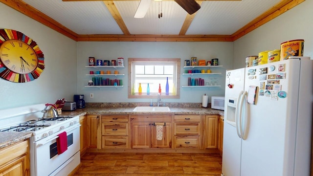 kitchen featuring light wood-style flooring, open shelves, a sink, white appliances, and ceiling fan