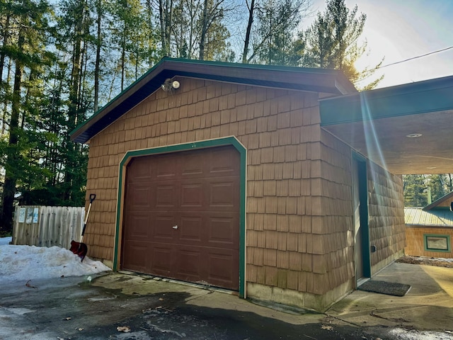 garage featuring fence