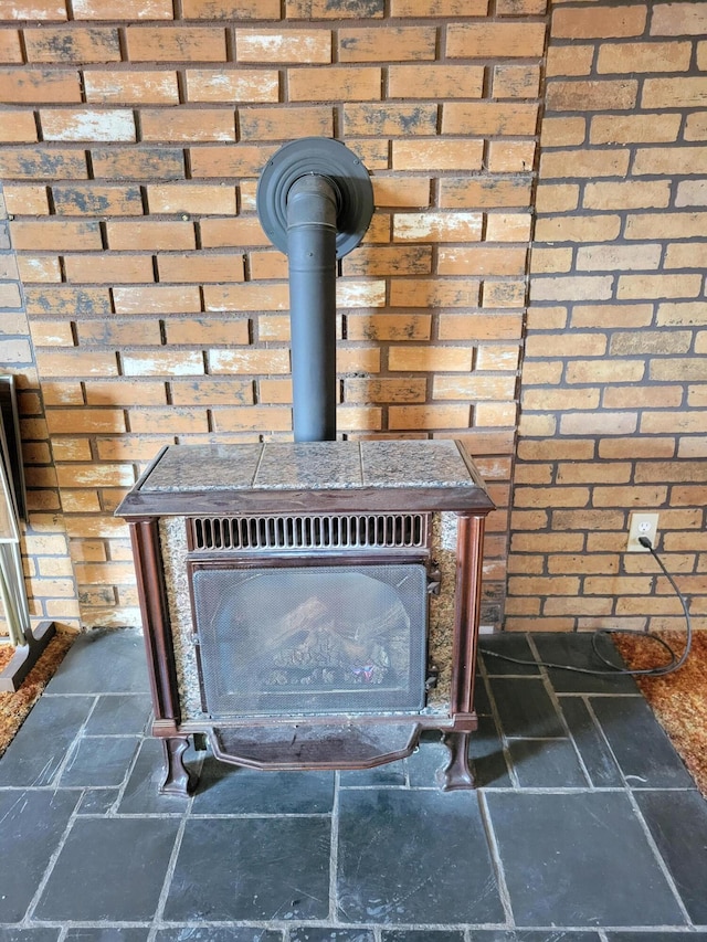 interior details featuring a wood stove