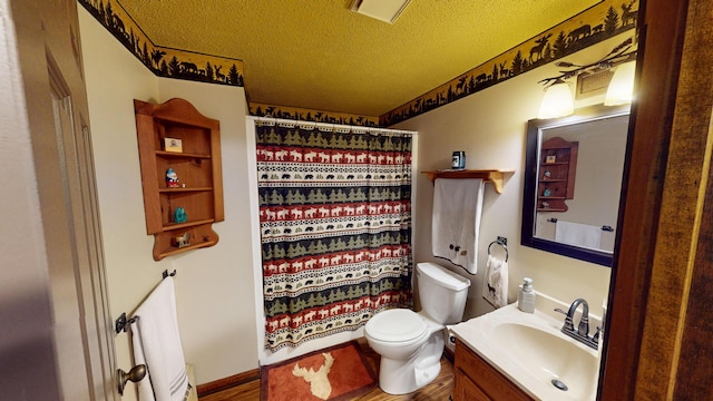 full bath featuring vanity, visible vents, a textured ceiling, curtained shower, and toilet