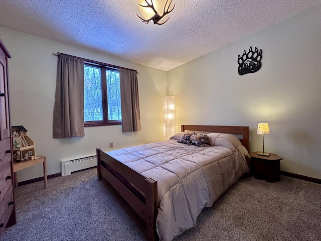 bedroom with a textured ceiling, carpet, baseboards, and a baseboard radiator