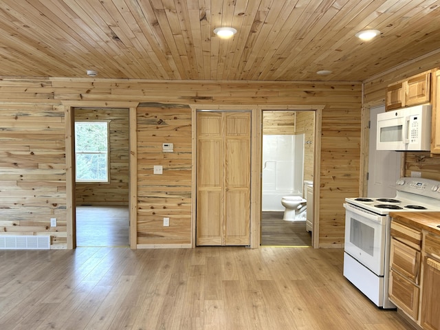 kitchen with white appliances, visible vents, light wood finished floors, light brown cabinetry, and wood ceiling