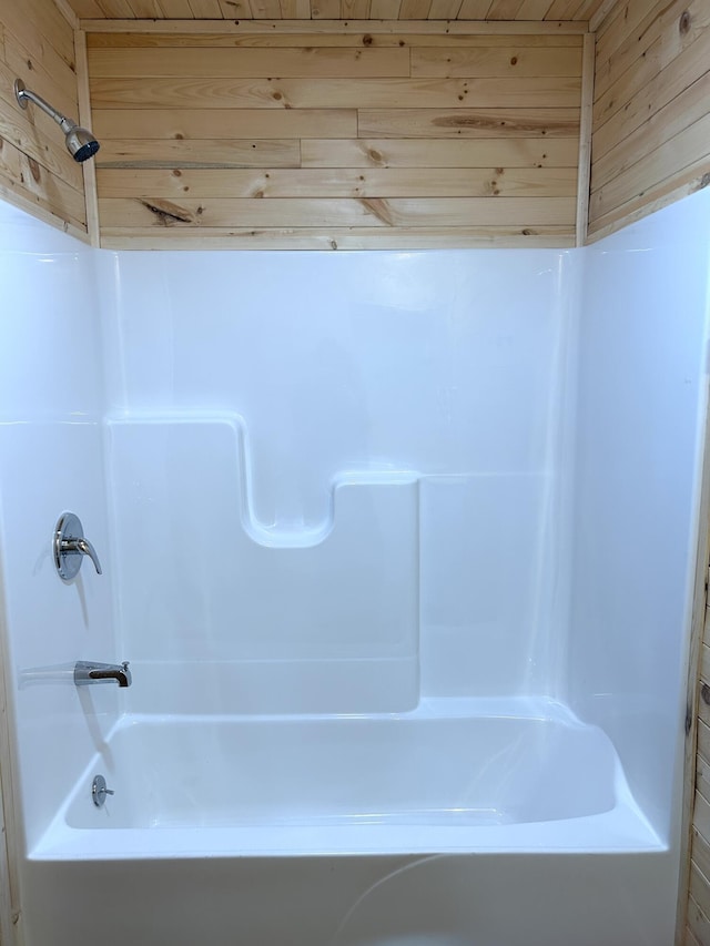 bathroom with wooden walls