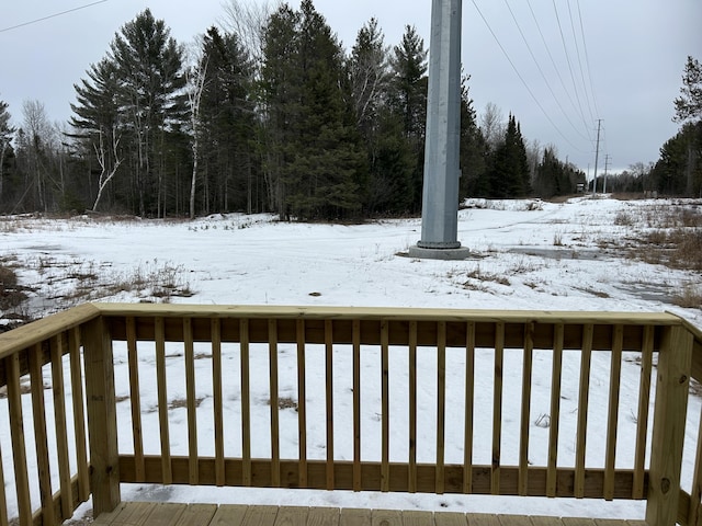 view of snow covered deck