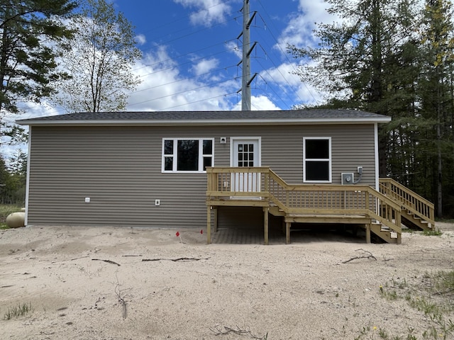 105 Sitting Bull Rd, Alpena, MI 49707 - back of property featuring a deck