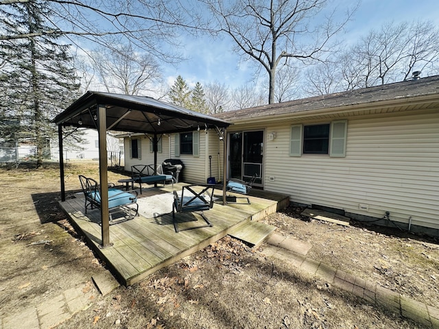 view of patio / terrace with a gazebo and a deck