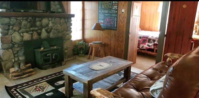 living room featuring a wood stove