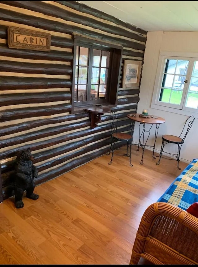 sitting room with wood finished floors